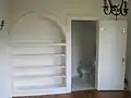 Master bedroom with bath & built-in shelving