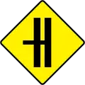 W 012LSide Road on Dual C'way - Left (with CR Break)