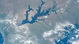 Image 67Orbital imagery of surrounding Lake Kyoga, showing vegetation, clouds and bodies of water (from Earth)
