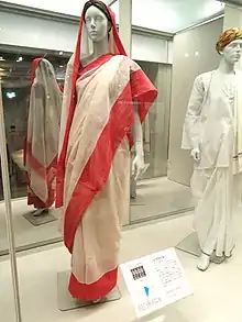 Image 97Red and cream Indian woman's saree, late 1990s (from 1990s in fashion)