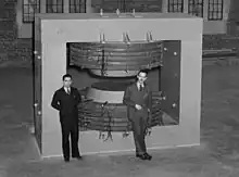 Photo of Langer with Franz N. D. Kurie in front of a cyclotron at Indiana University in 1940