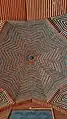 Some peripheral domes feature colored tiles as well as brick