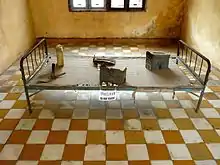 Image 21Iron bed in torture room at Tuol Sleng Genocide Museum, Phnom Penh