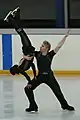 An ice dancing lift with the lifting partner in an Ina Bauer position (Isabelle Delobel & Olivier Schoenfelder)