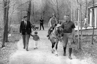 John F. Kennedy, John F. Kennedy Jr., and Caroline Kennedy (riding 'Tex')