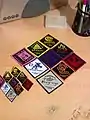 A full set of Jamboree 2008 Subcamp badges accompanied by a full set of Subcamp pins forming a diamond
