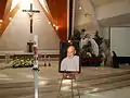 Funerary portrait of Reuter beside the Paschal candle