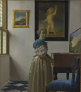Johannes VermeerLady Standing at a Virginal