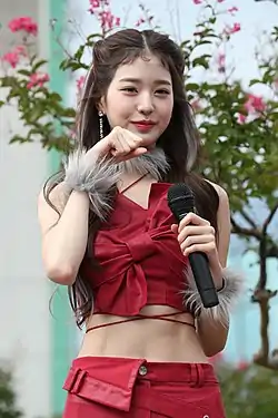 Jang posing for the camera at Music Bank fan meeting in September 2022