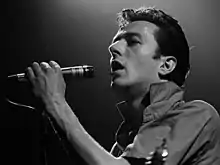 Strummer performing live with the Clash at the Tower Theater in Upper Darby, Pennsylvania, 1980