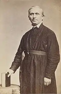 Photograph of John Bapst standing