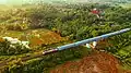 Pangrango train passing through a bridge at the section between Cigombong and Maseng station