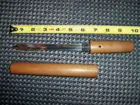 Ken tantō, a double-edged straight sword in wooden mounts shirasaya.