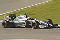 After losing the Vodafone sponsorship in 2013, the McLaren MP4-29 ran with a silver only car, with the car's name on the sidepod, as seen driven by Kevin Magnussen (2014).