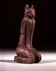Statue of a semi-anthropomorphised cat