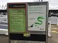 Notices at the wharf advising passengers to go to King Street Wharf 3 for Sydney Ferries services.