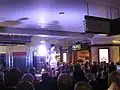 A fashion show at the mall on November 14, 2009. Peoples Jewelers and the former Black's Photography can be seen.