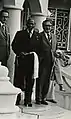 Secretary of State Dr. Henry Kissinger (right), is widely credited with playing a driving role in American foreign policy during the first half of the 1970s, particularly in regards to Cold War policy.