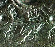 Horse chariots during the Kofun period.  Detail of bronze mirror (5th–6th century). Eta-Funayama Tumulus, Kumamoto.
