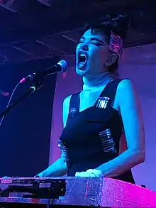 Kristeen Young performing at the Coffin Club, Portland OR, December 9, 2022