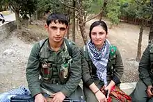 YPG and YPJ fighters in Syria with keffiyehs