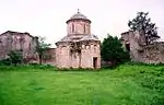 Church and fortified walls.