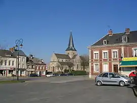 The town hall square and church in Saint-Laurent-en-Caux
