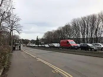 Traffic outisde Cameron Toll Shopping Centre on Lady Road, Edinburgh.