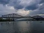 A cantilever truss bridge, Quebec Bridge over the Saint Lawrence River in Quebec, Canada.