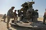 Preparing to load the breech in Afghanistan, August 2009