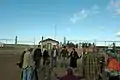 Lois Gibbs joins a circle of mine opponents to sing, pray and strategize at the entrance to the Kennecott Minerals sulfide mine that is being built near Lake Superior close to Big Bay, MI
