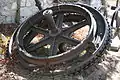 Cable drive bull wheel salvaged from the Incline Powerhouse prior to demolition in 1962. The assembly stands as a monument to the Mount Lowe Railway.