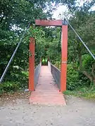 The suspension bridge over the Lugton Water.
