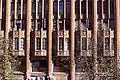 Detail of the eastern facade, showing second-floor bay windows and third-floor balconies.