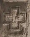 Photograph of a mandala carving on wooden door panel. Fua Mulaku Island, 1986
