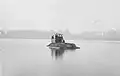 Mark IX Tank Amphibious Conversion in Welsh Harp Reservoir, with all of its passengers out on top