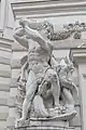 Statue of Hercules slaying the Lernaean Hydra, exterior façade statuary on St. Michael's Wing