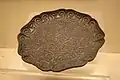 A Ming Dynasty (1368-1644) black lacquerware plate