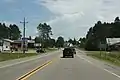 Looking east at the sign for Monico