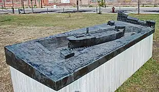 Monument at the site of Detroit Dry Dock No. 2, depicting the steamer Pioneer in the dry dock.