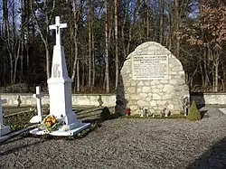 Monument and cross at the cemetery of Polish victims of the German Nazi massacre in Sochy from June 1, 1943
