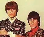 Roger Daltrey and Pete Townshend of The Who sporting mop-top haircuts, which were considered at the time a rebellious hairstyle.