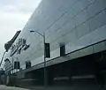 Chrome panels accent original tile work on the Grand River façade