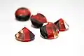 Three-tone cubic zirconia gems