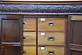 Directors had their own storage drawers in the board room