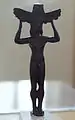 Kouros as a handle, archaic small bronze, 560-540 BC
