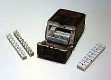 Image 28An ivory set of Napier's Bones, an early calculating device invented by John Napier (from Scientific Revolution)