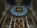 The icon in its mosaic frame, enshrined above the high altar, which is covered by a ciborium.