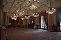 The former Reading Room, The National Liberal Club, this is on the first floor and served the Gladstone Library accessible through the end door on the left, the door on the right leads to the secondary staircase that links all floors in the building, note the vents in the ceiling for the mechanical ventilation system, the walls as well as the columns are clad in faience, the light fittings are not the originals