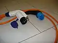 Adaptor cable from Nissan with type 1 plug for the car, type 2 plug for a European charger socket